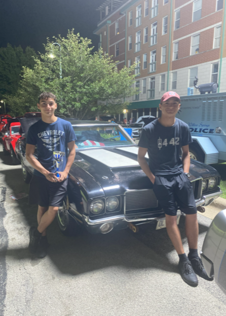 Jimmy and Danny beside car they built